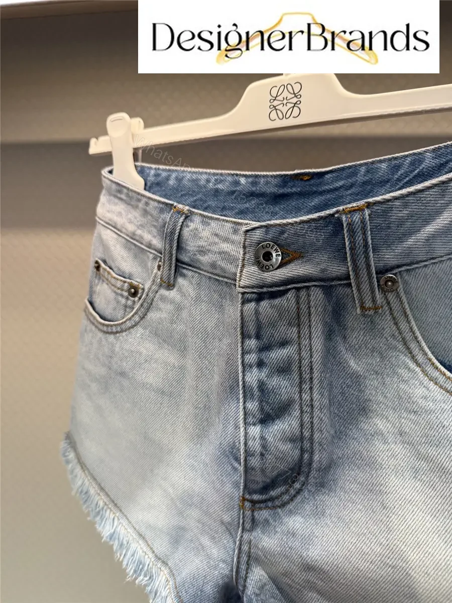 View 2 of LOEWE Paula Ibiza Anagram Embroidered Denim Shorts