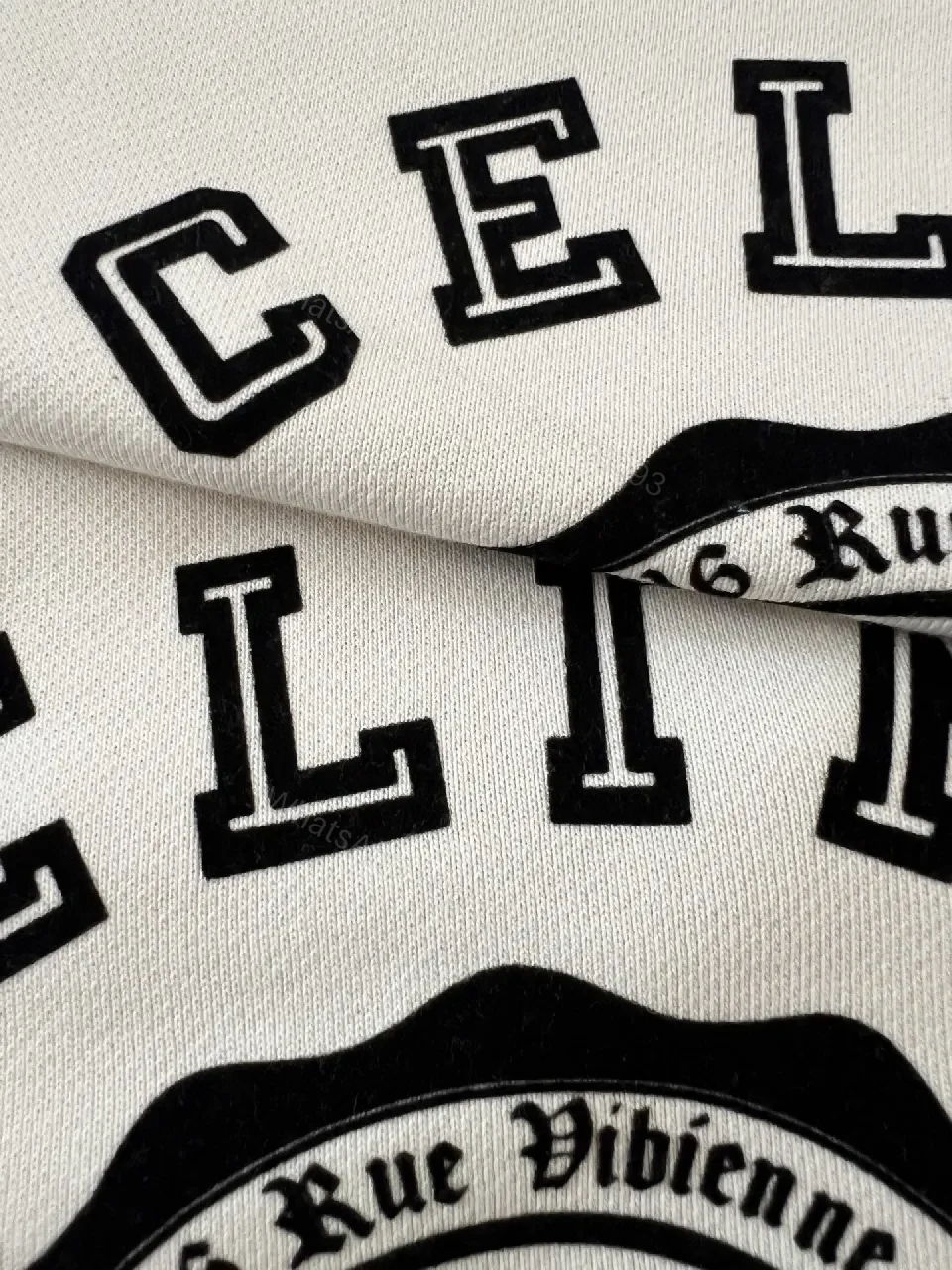 View 3 of Bold Contrast Crest Sweatshirt - Cream Body, Black Sleeves, Luxe Comfort