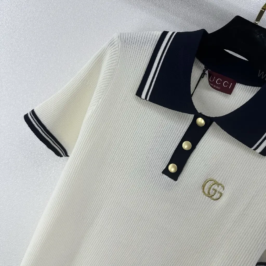 View 3 of Cream/Navy Ribbed Polo Shirt with Gold Accents