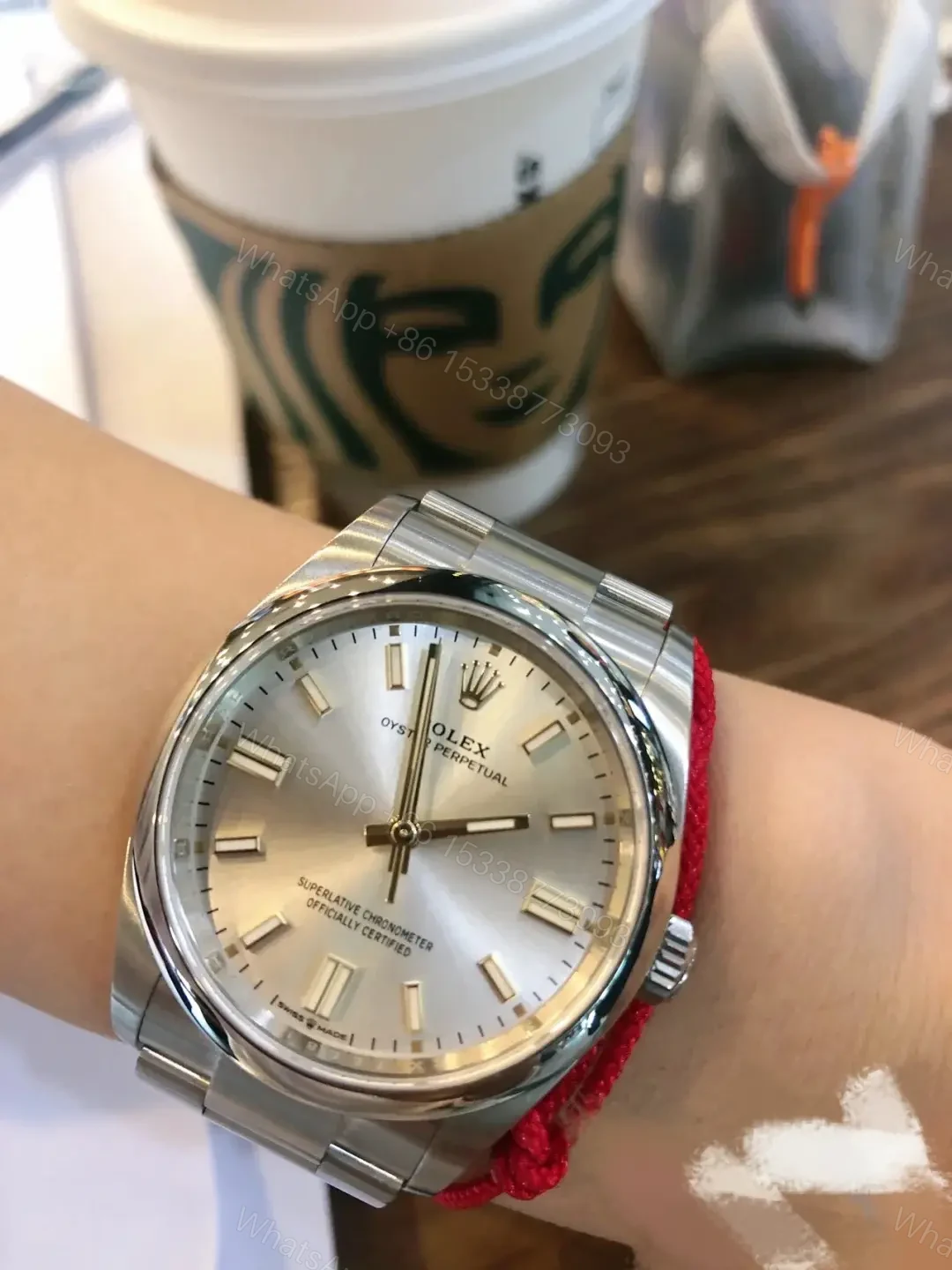 View 6 of Rolex Oyster Perpetual 41 Stainless Steel Silver Dial 124300-0001