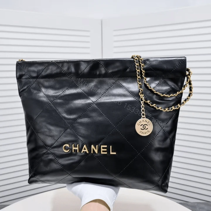 View 4 of Chanel 22 Handbag Shiny And Gold Tone Metal Black 42Cm AS3261 B19059 94305