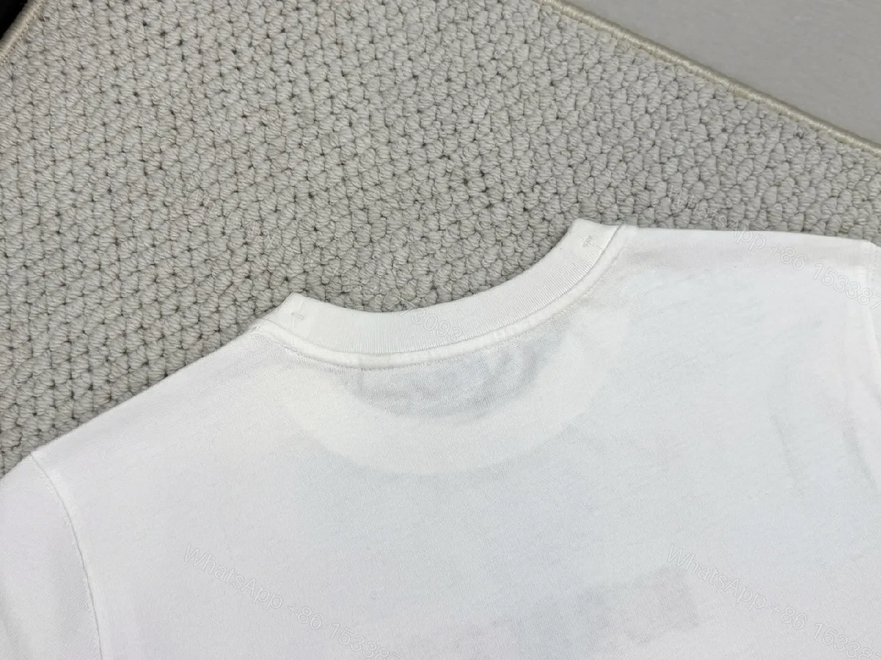 View 9 of White Cotton Tee with Metallic Crest Detailing, Premium Casual Style