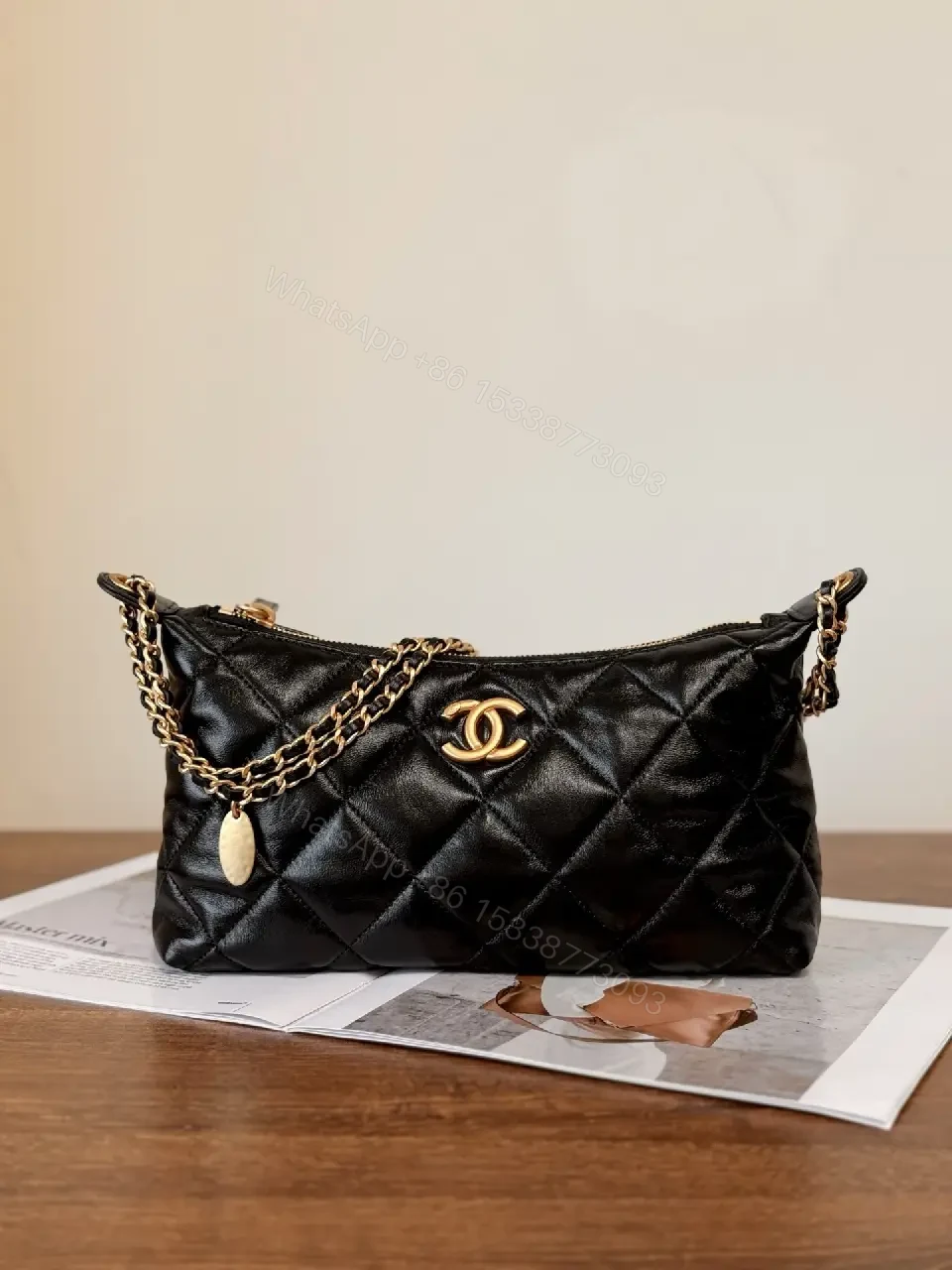 View 8 of Quilted Crossbody with Gold Emblem: Compact Luxury Bag