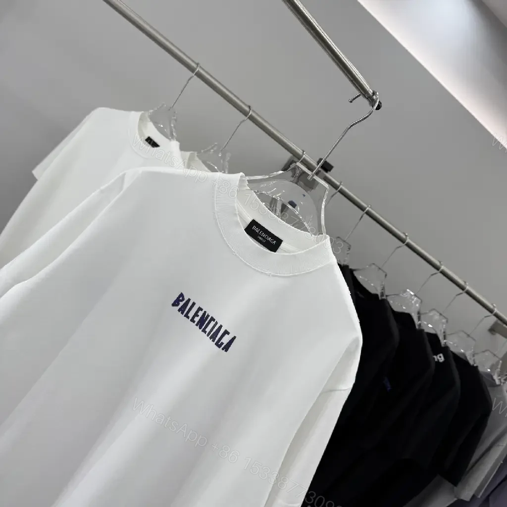 View 4 of White Cotton Minimalist Tee with Centered Logo