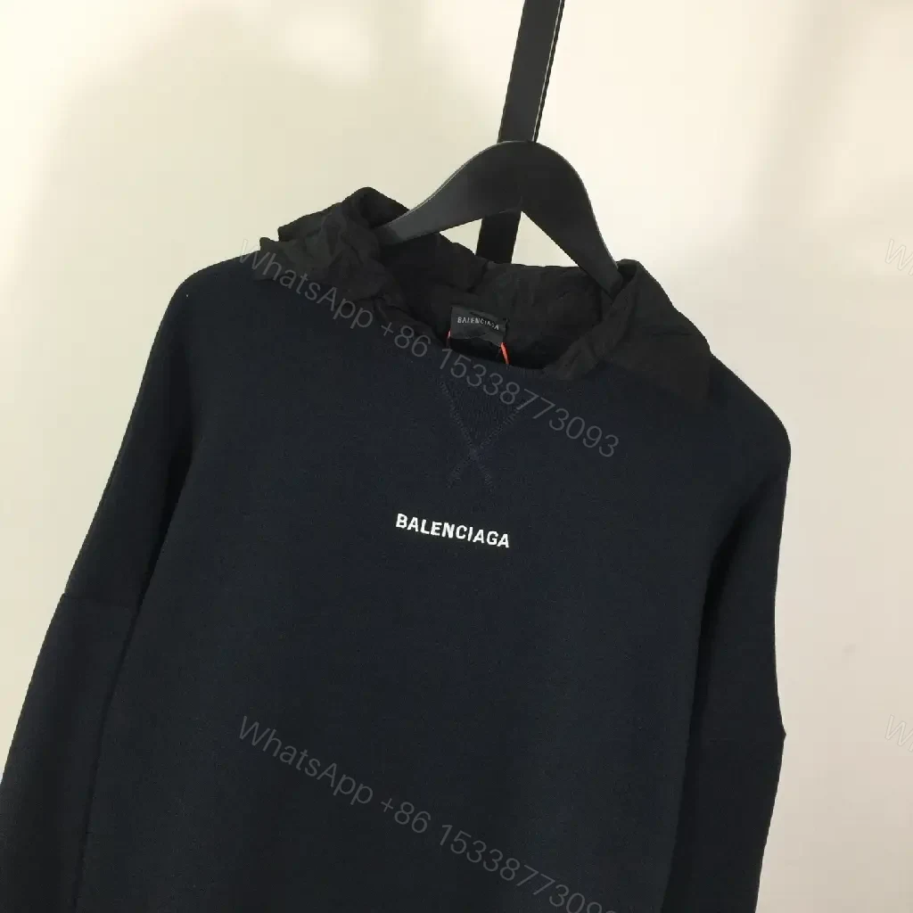 View 2 of Deep Black Hoodie: Minimalist Logo, Premium Knitwear, Relaxed Fit