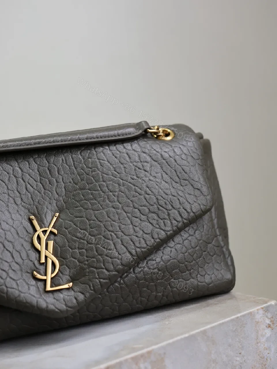 View 4 of Textured Leather Envelope Bag: Black + Gold Accent, Compact Luxury Shoulder Bag