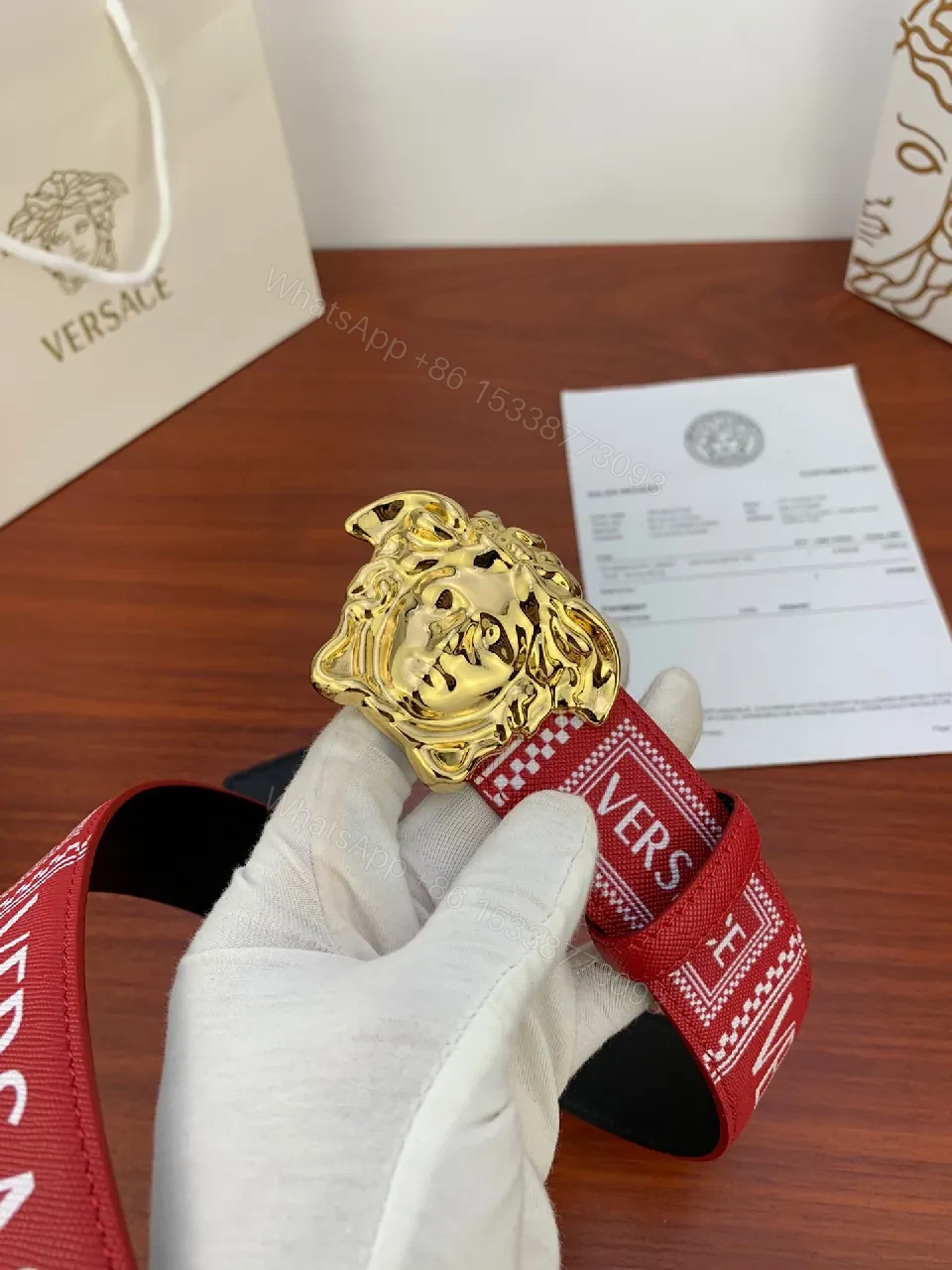 View 3 of Red Leather Belt with Gold Medusa Buckle, Luxe Versatile Accessory