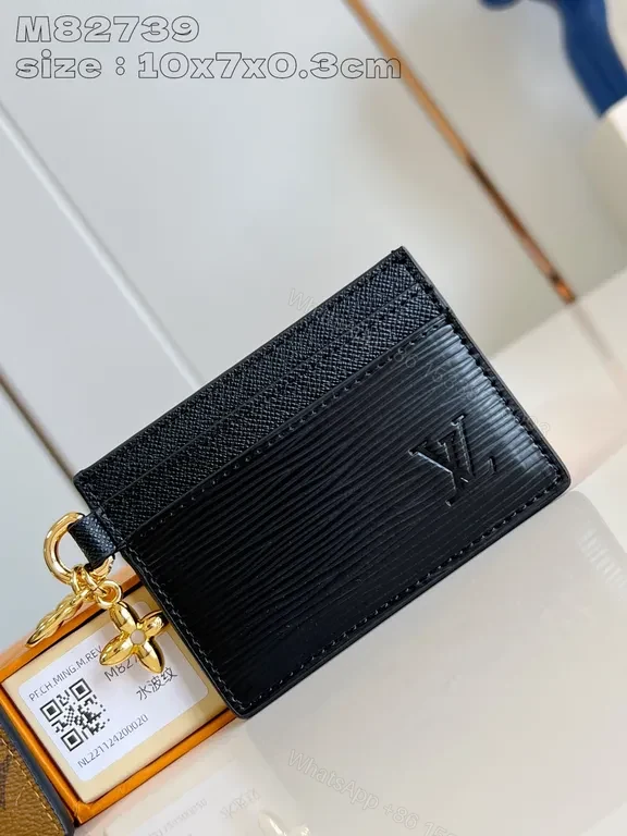 Compact Black Textured Wallet with LV-Style Logo Details — view 1