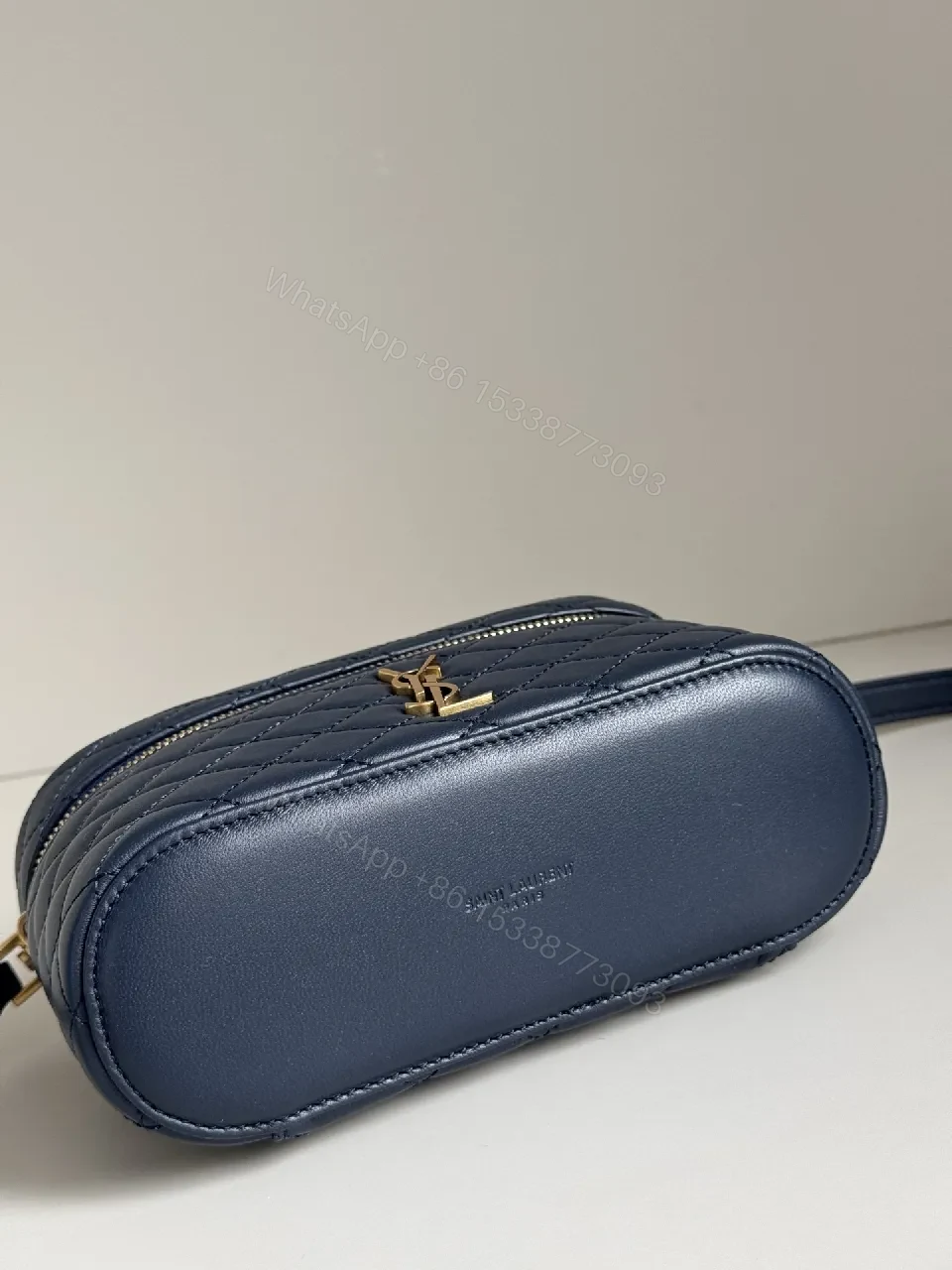 View 9 of Navy Quilted Leather Crossbody Bag with Gold Hardware