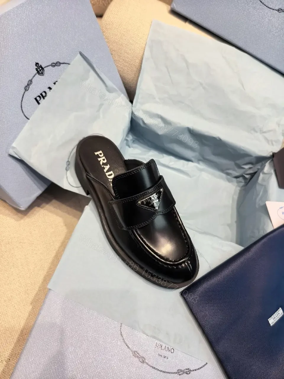 View 9 of Black Leather Prada Mules with Logo Detail Sliders, Women’s Fashion