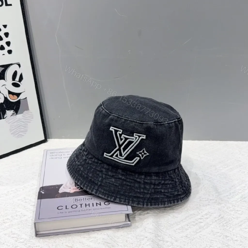 View 2 of Denim-Textured LV Logo Bucket Hat: Modern Luxury Comfort