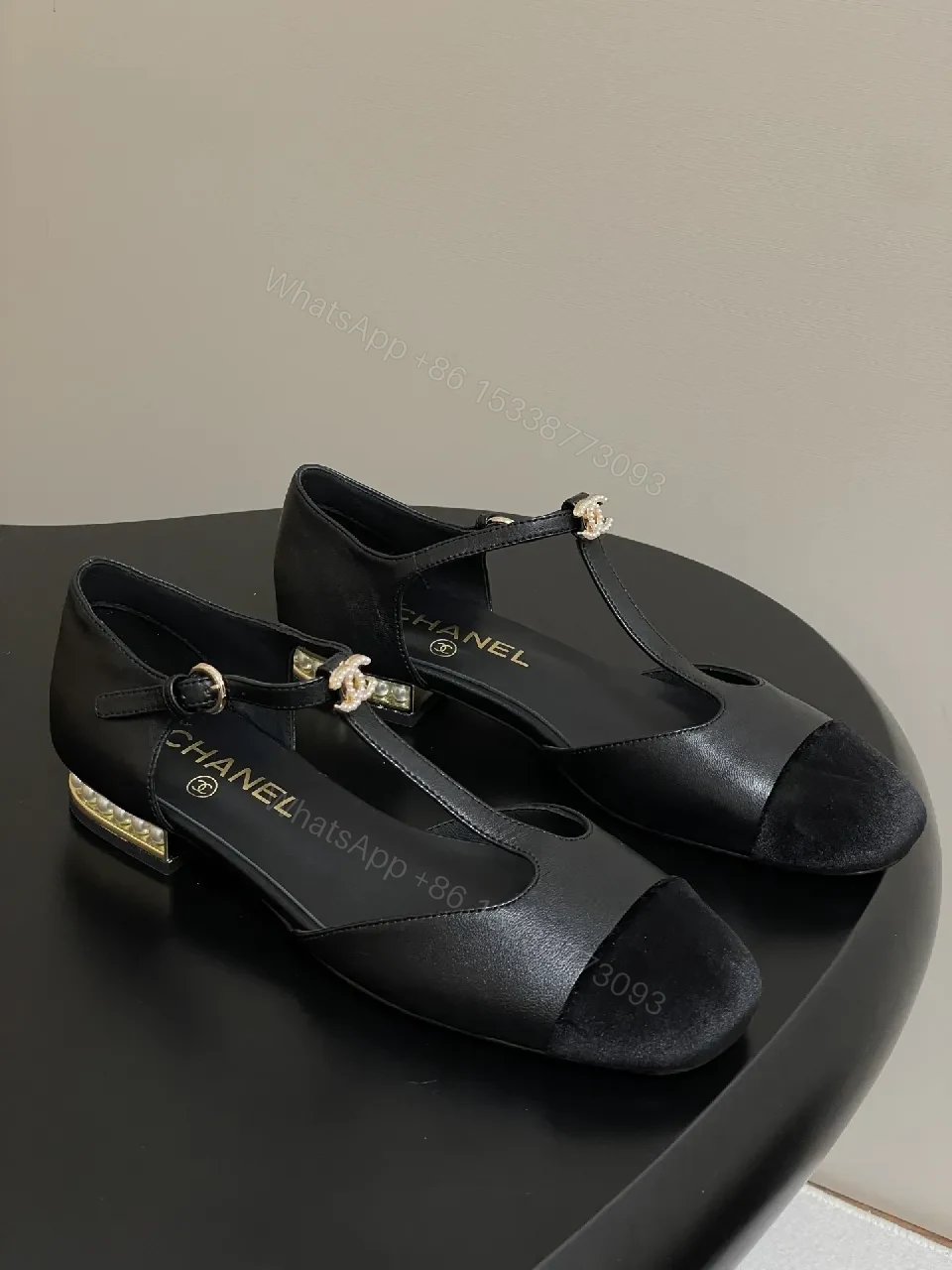 Chic Black Suede T-Strap Pumps with Pearl Clasp — view 1