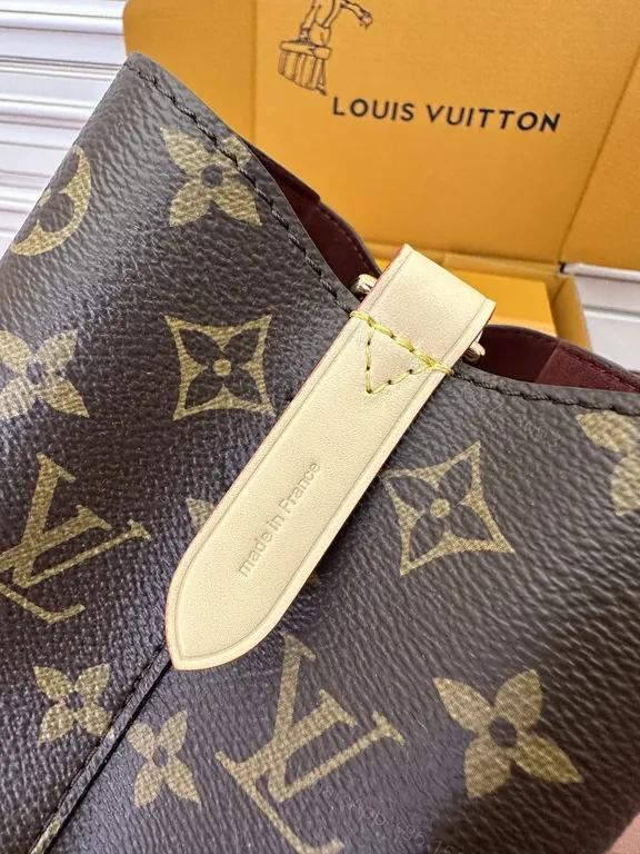 View 8 of Elegant Monogram Barrel Bag â€” LV Canvas, Leather Trim, Adjustable Strap, Day-to-Night Luxury