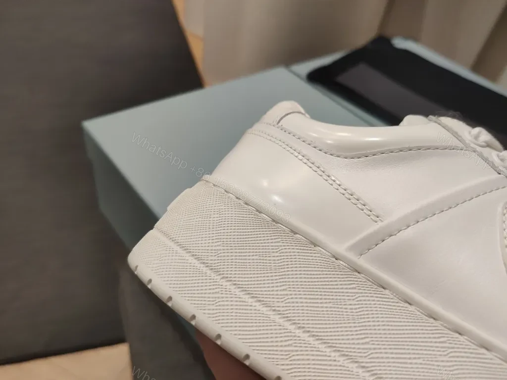 View 2 of Premium White Prada-Style Sneaker: Luxury Comfort for Everyday