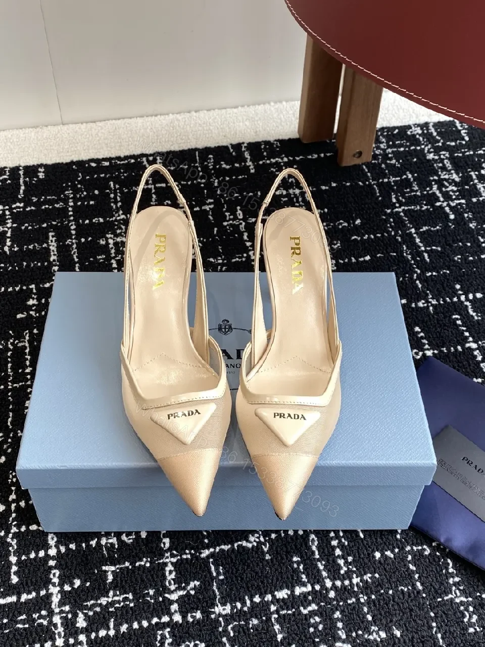 Elegant Leather Slingbacks with Triangle Logo Detail — view 1