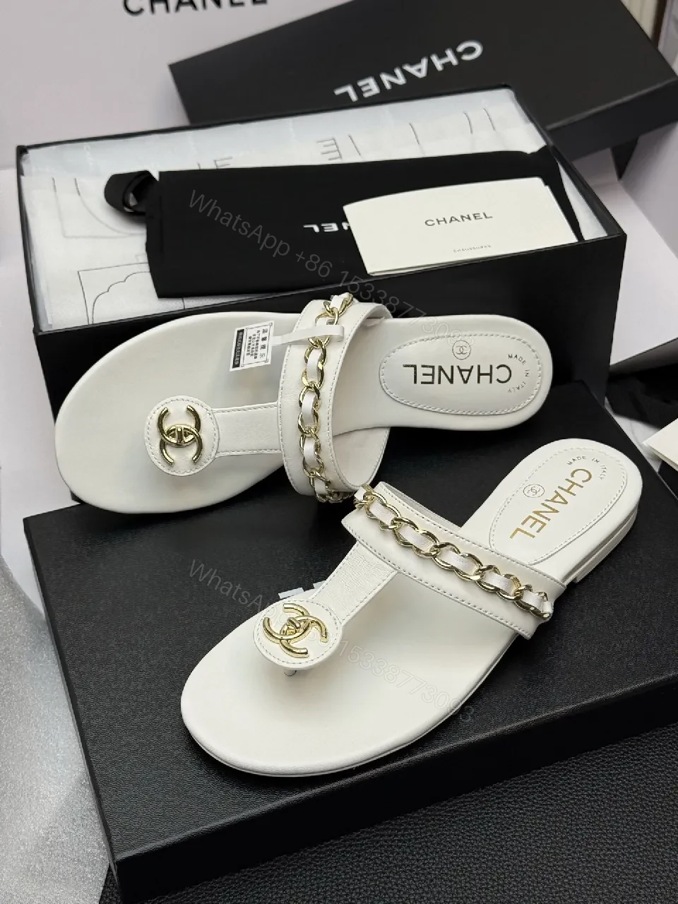 View 3 of Elegant White Leather Sandals with Gold Chain Accent