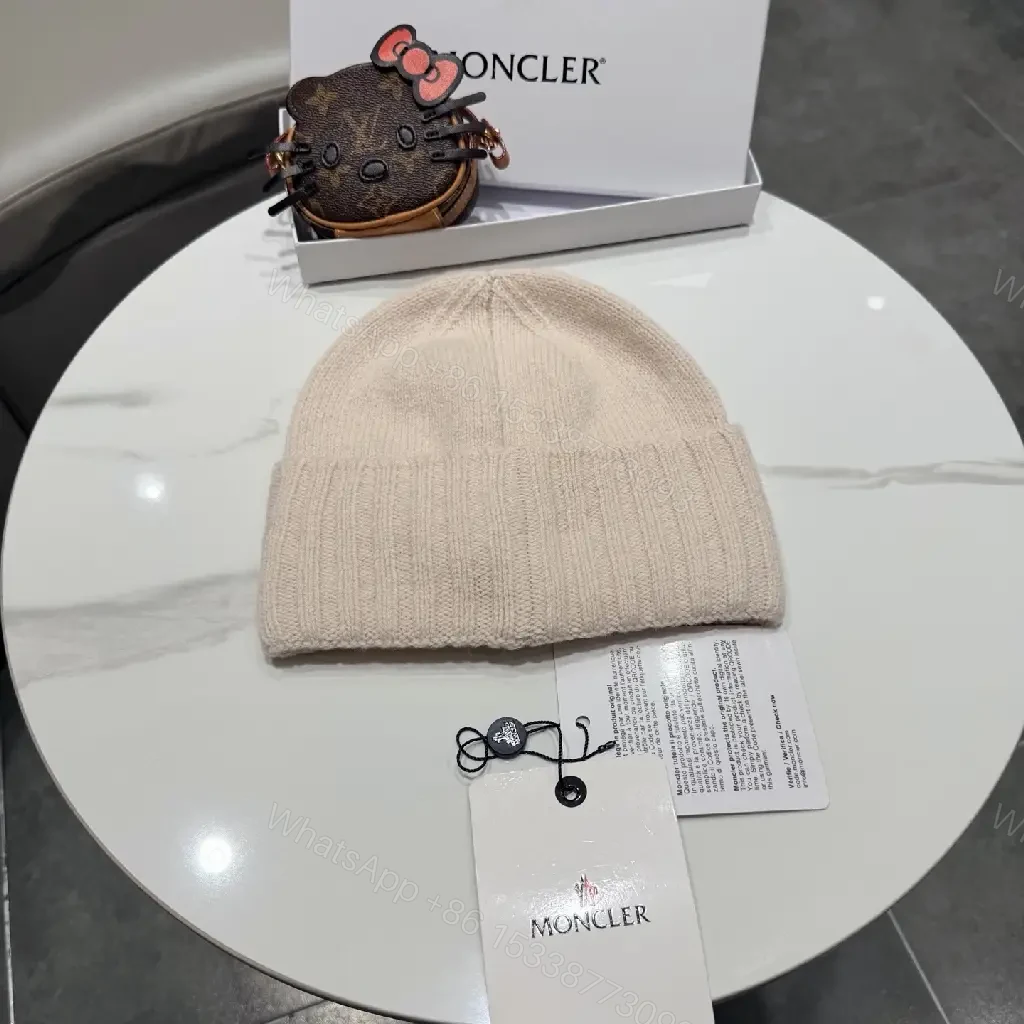 View 6 of Beige Wool Knit Beanie, Subtle Crest, Everyday Luxury