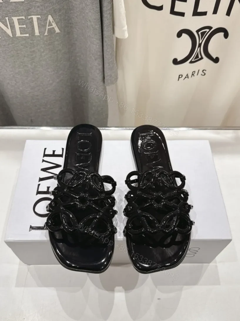 View 5 of Loewe Leather Petal Anagram Slides in Black