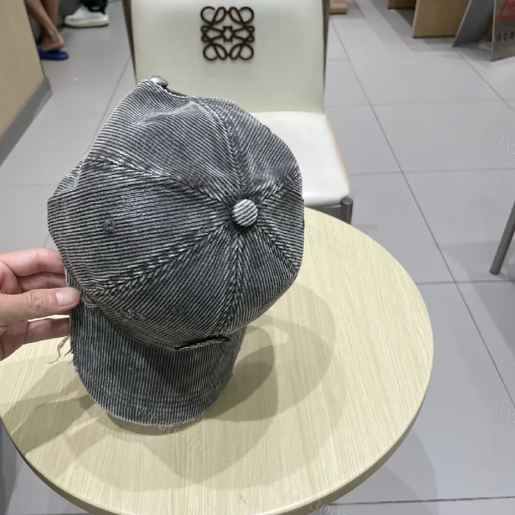 View 8 of Denim-Texture Cap with Monogram Emblem – Street-Ready Comfort