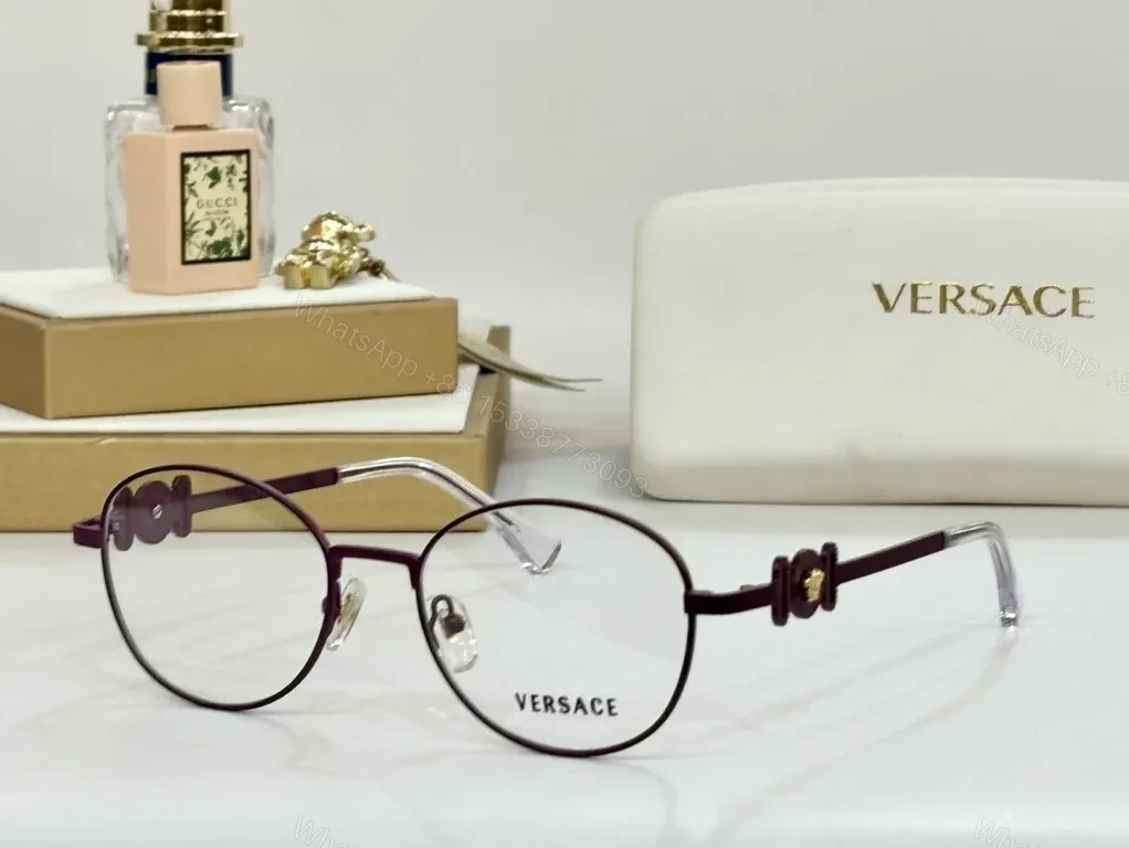 View 3 of Refined Round Eyewear: Luxury Metal Frames with Signature Detail