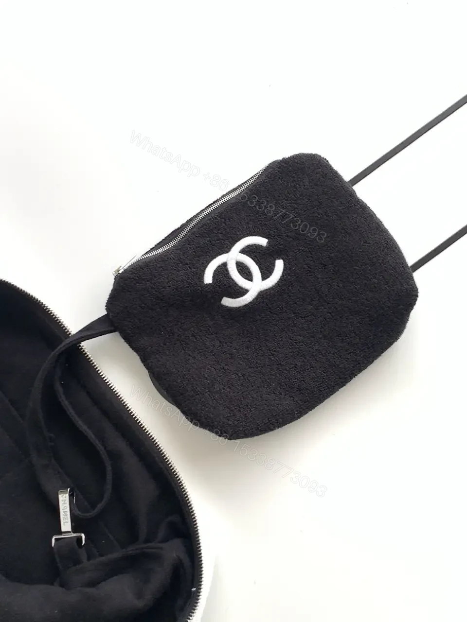 View 2 of White Fabric Handbag with Black Trim Slouchy Style Chanel Logo Tote