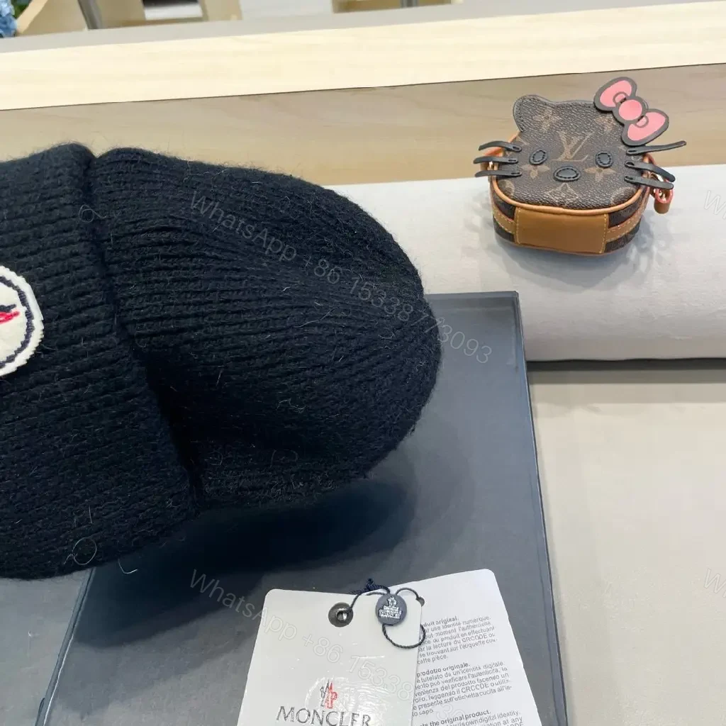 View 4 of Wool Blend Beanie with Crest Embroidery, Black, Modern Luxury Edge