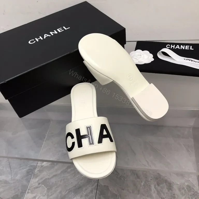 View 2 of Chanel-Inspired White Leather Slides with Bold Logo Strap