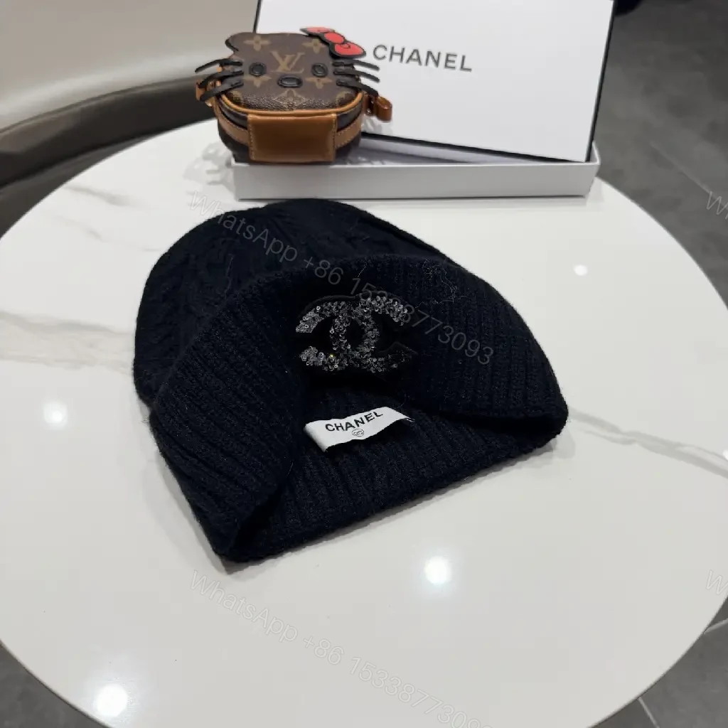 View 2 of Black Knit Beanie with Subtle Crest – Lux, All-Season Comfort