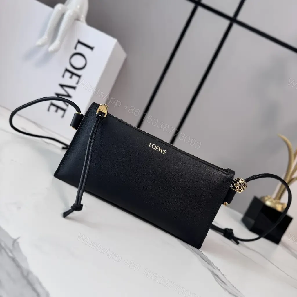 View 9 of Chic Black Leather Crossbody with Gold Hardware