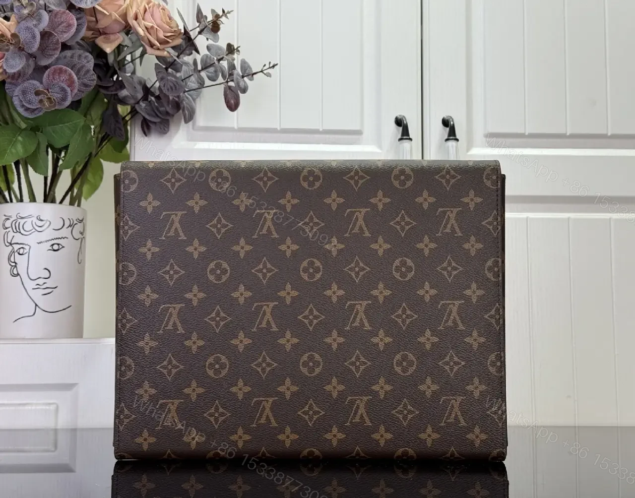 View 2 of Brown Coated-Canvas Clutch: Monogram, Structured, Gold Hardware