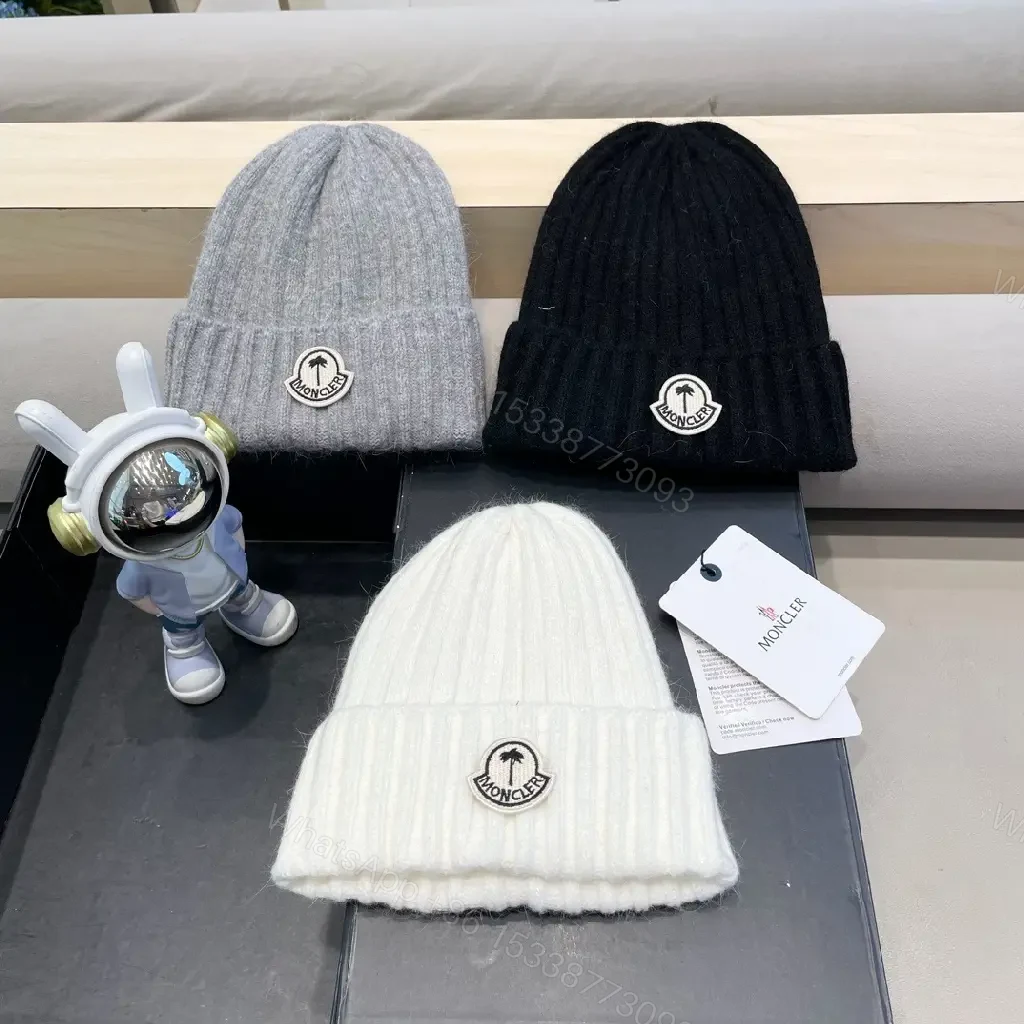 View 3 of Cozy Black Knit Beanie with Signature Patch, Luxury Style