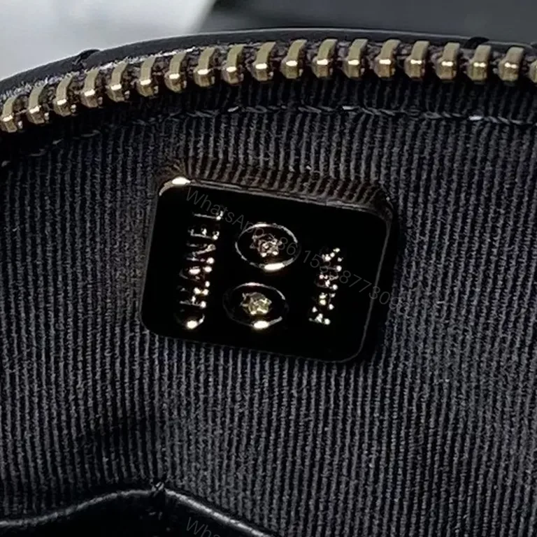 View 5 of Mini Quilted Black Flap Bag with Gold Chain â€” Everyday Luxe
