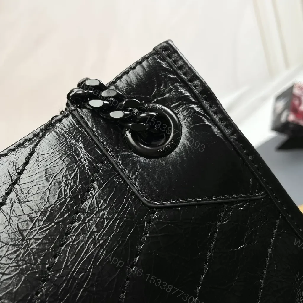 View 4 of Matte Black Quilted Leather Shoulder Bag: Chic Minimalist Style