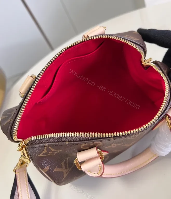 View 6 of Structured Monogram Mini Tote: Compact, All-Season Luxury