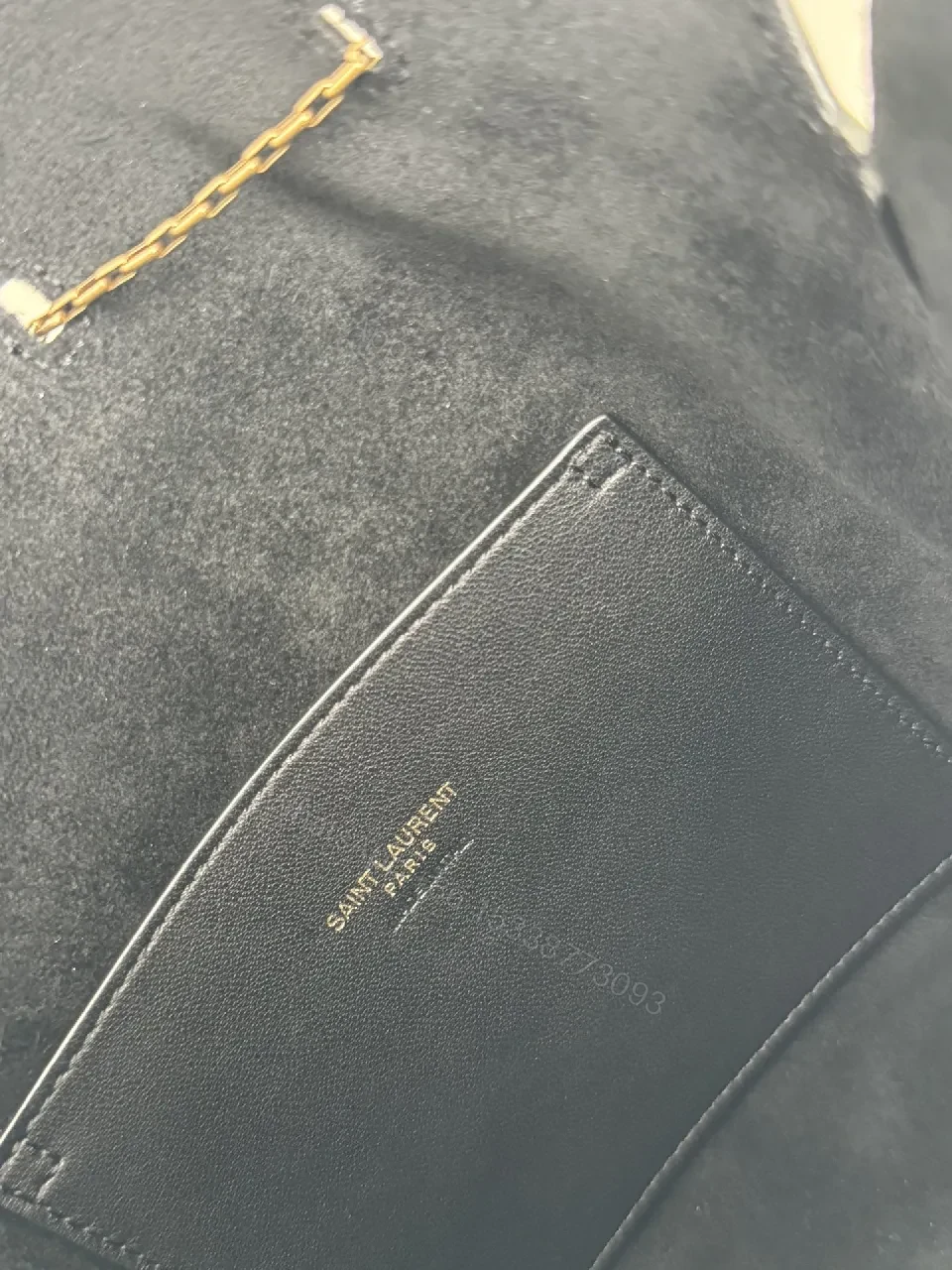 View 5 of Chic Black Leather Bucket Bag with Gold Logo