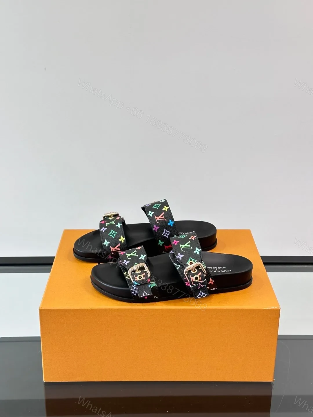 View 3 of LV Men Black Leather Multicolor Monogram Slides