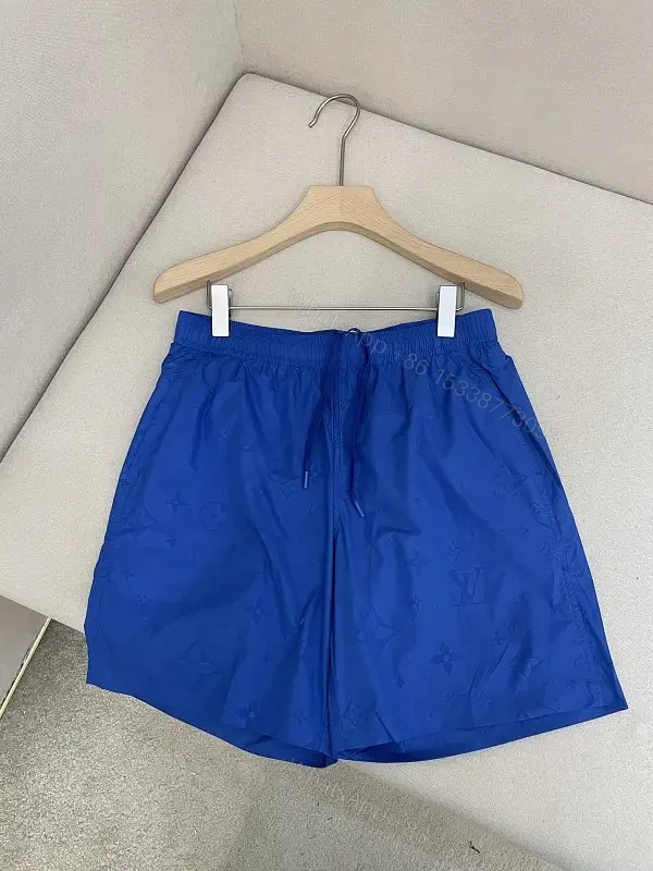 Blue Silk-Like Drawstring Shorts, Louis Vuitton Monogram Style, Swim/Active Type — view 1
