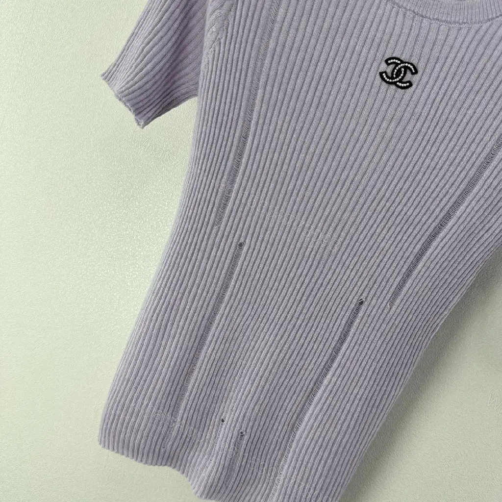 View 2 of Soft Lilac Knit Tee: Subtle Emblem, Effortless Luxury Top