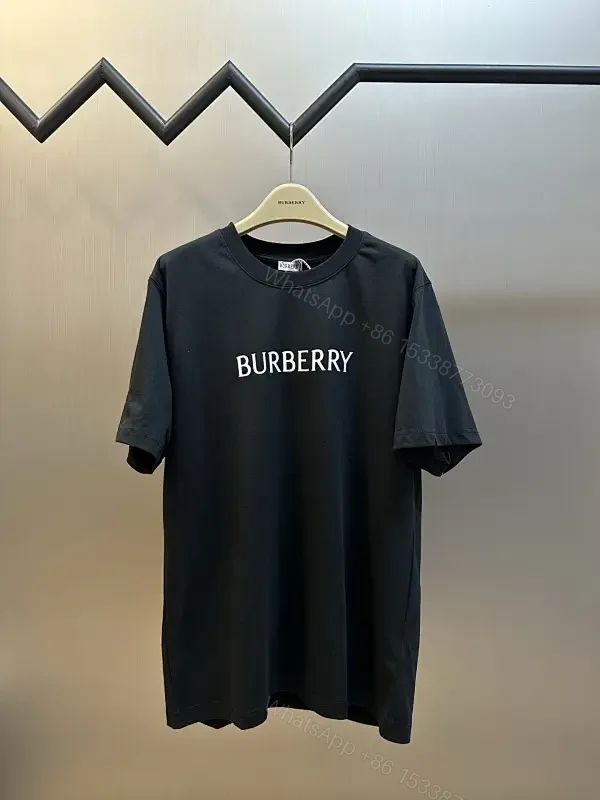 Minimalist Black Cotton Tee | Relaxed Fit, Logo Accent, Everyday Luxury — view 1