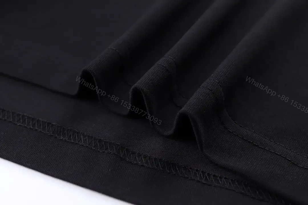 View 9 of Graphic Logo Tee: Black Cotton Streetwear Essential