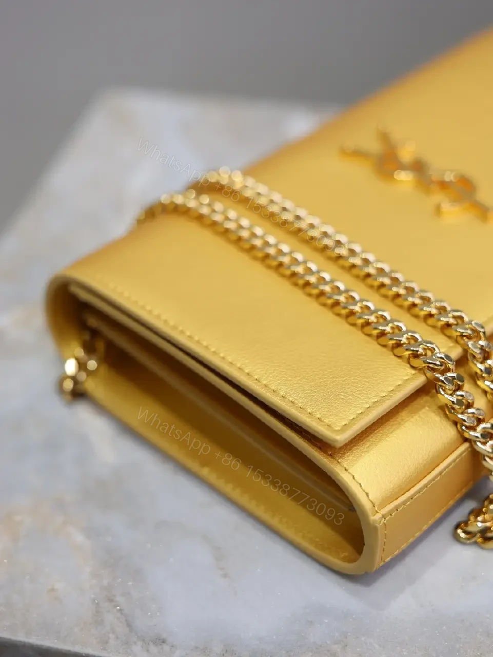View 9 of Gold-Tone Leather Clutch Wallet with YSL Hardware