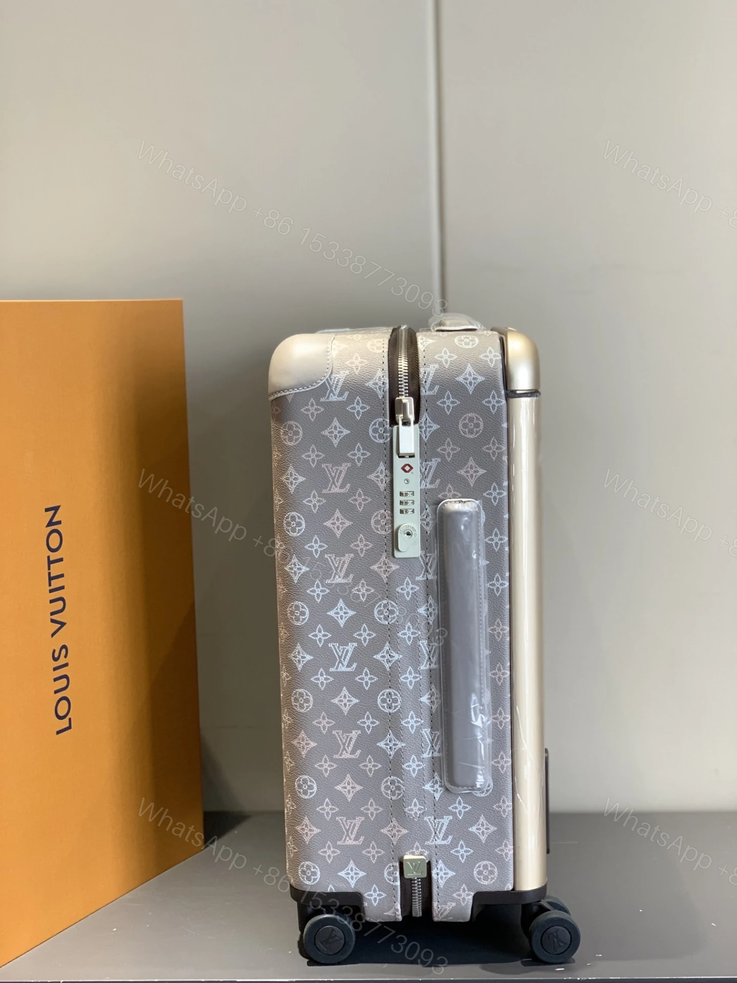 View 5 of Louis Vuitton Horizon 55 Suitcase Mahina Perforated Calfskin Leather Gray 55Cm M10282