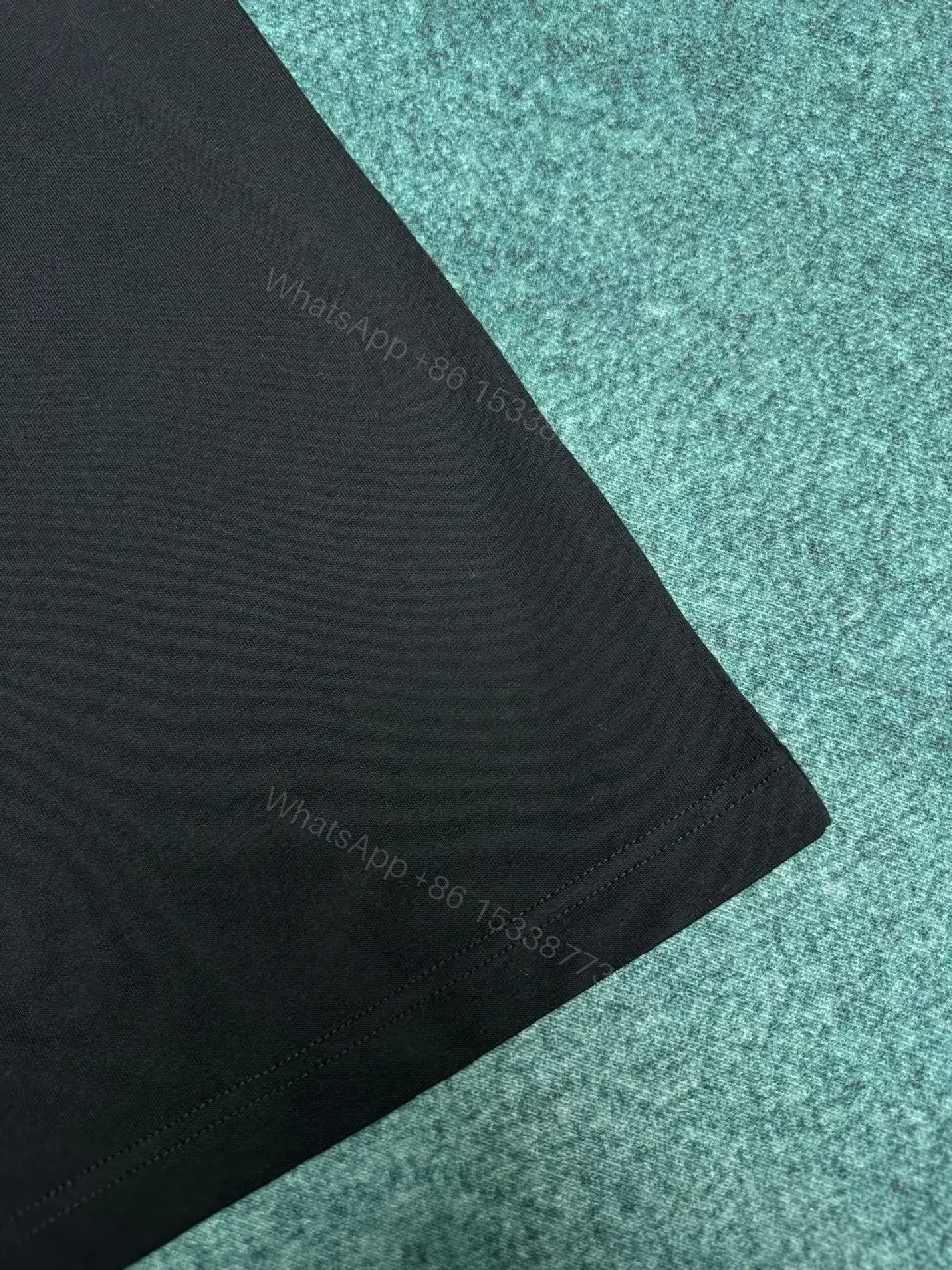 View 10 of Minimalist Black Tee: Crest-Inspired, Elevated Comfort Tee