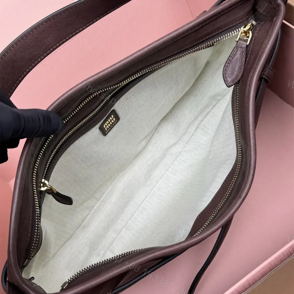 View 9 of 高仿miumiu*Aventure系列5BC181小羊皮腋下包石楠木色中號免檢版