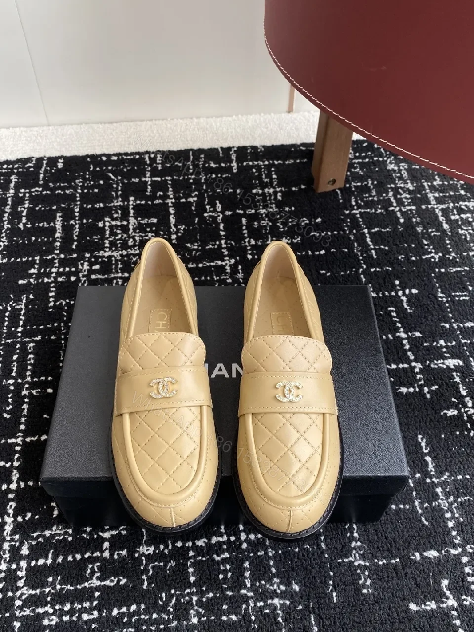 View 3 of Cream Quilted Leather Loafers with Gold Emblem – Everyday Luxury