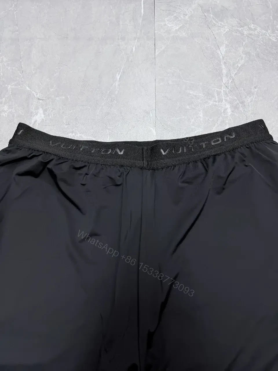 View 4 of Sporty Luxe Black Shorts with Subtle Luxury Details