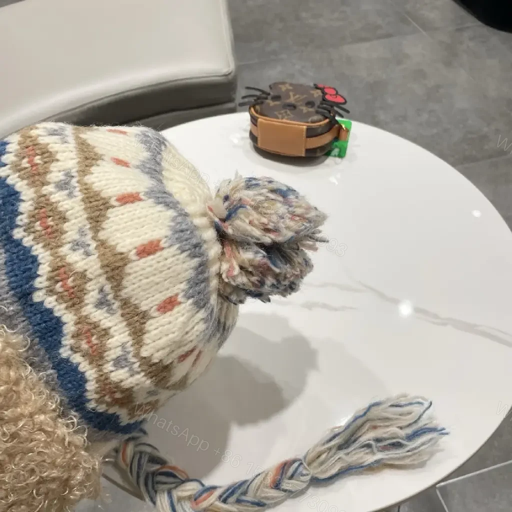 View 9 of Cozy Alpine Knit Beanie with Faux Shearling Brim and Patch