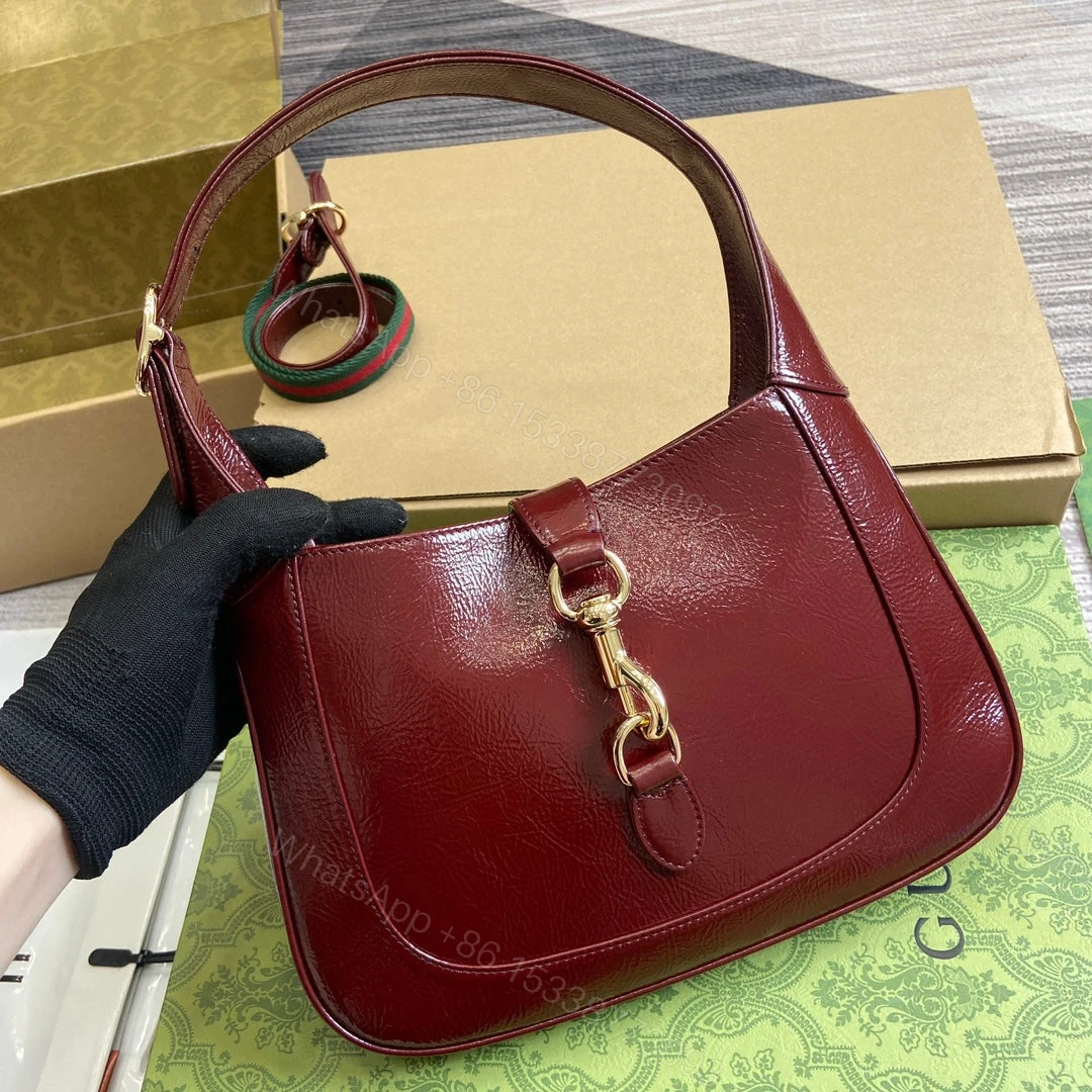 View 3 of JACKIE SMALL SHOULDER BAG 27 IN WINE RED CRACKED LACQUER CALFSKIN GOLD HARDWARE