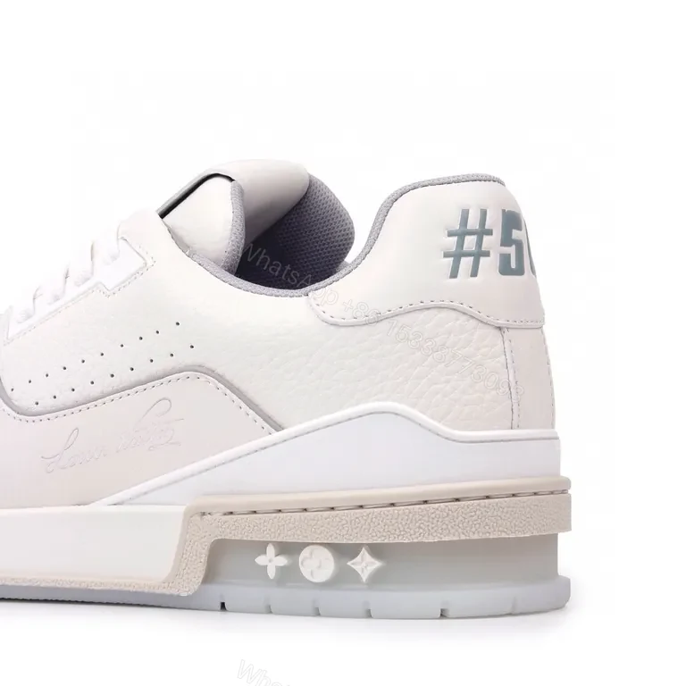 View 9 of Minimalist White Luxury Sneakers - Premium Leather, Subtle LV Details, All-Day Comfort