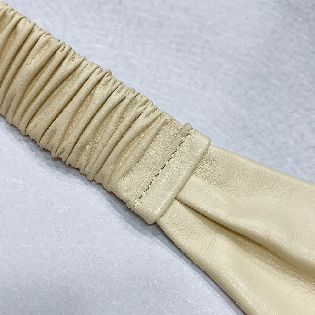 View 3 of Ivory Faux Leather Headband with Gold Logo Emblem - Chic, Everyday Glam